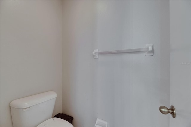 bathroom featuring toilet