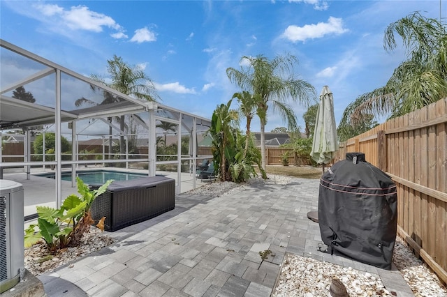 view of patio with a fenced backyard, an outdoor pool, grilling area, cooling unit, and glass enclosure