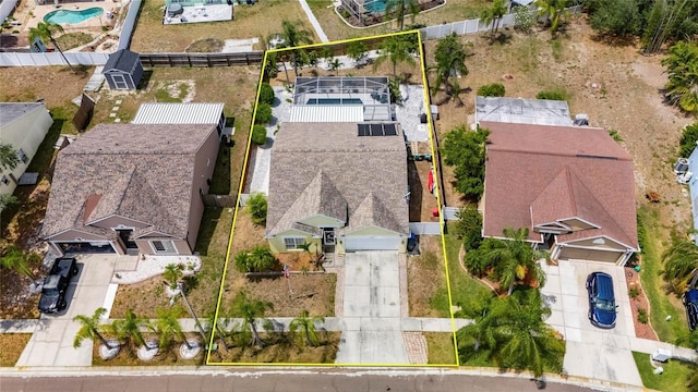 aerial overview of property's location with property boundaries highlighted and a pool