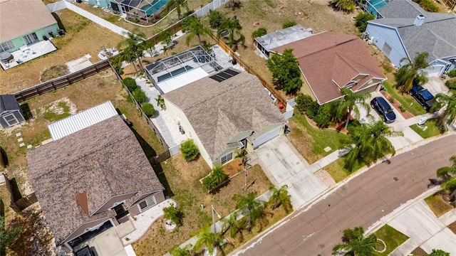 aerial view of property and surrounding area with nearby suburban area
