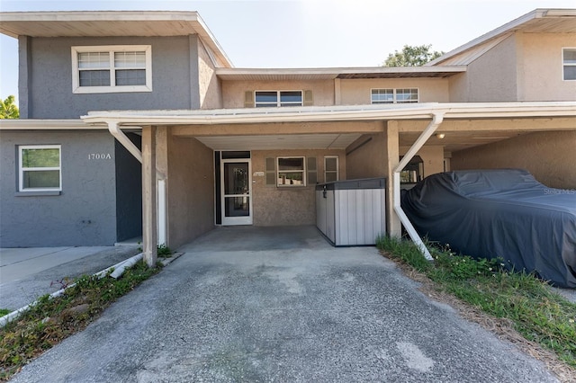 exterior space featuring stucco siding
