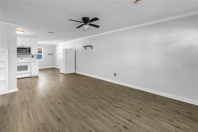 unfurnished living room featuring ceiling fan, ornamental molding, baseboards, and wood finished floors