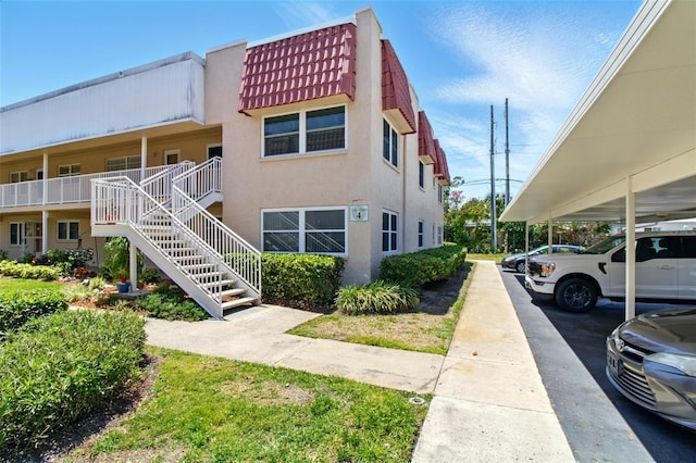 view of building exterior with stairs