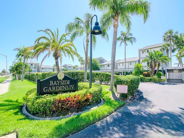 1301 Gulf Blvd Unit 107, Clearwater Beach, FL 33767 - community / neighborhood sign with a residential view and a lawn