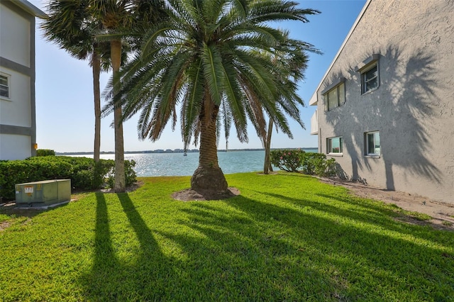 1301 Gulf Blvd Unit 107, Clearwater Beach, FL 33767 - view of green lawn with a water view