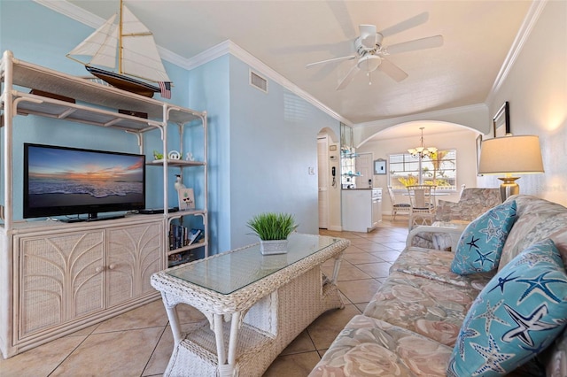 19417 Gulf Blvd Unit E217, Indian Rocks Beach, FL 33785 - living room featuring ceiling fan with notable chandelier, light tile patterned floors, arched walkways, ornamental molding, and visible vents
