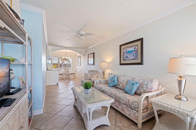 19417 Gulf Blvd Unit E217, Indian Rocks Beach, FL 33785 - living area with arched walkways, crown molding, ceiling fan with notable chandelier, and light tile patterned floors