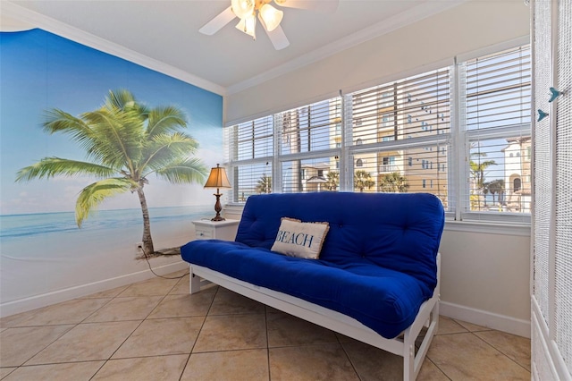 19417 Gulf Blvd Unit E217, Indian Rocks Beach, FL 33785 - living area featuring ceiling fan, baseboards, crown molding, and tile patterned floors