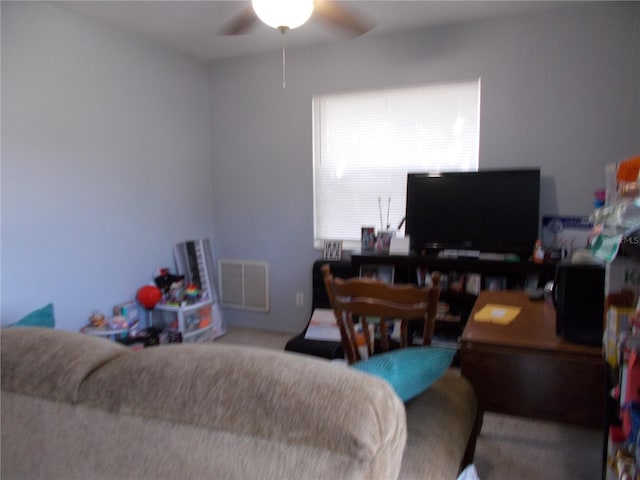 433 73rd Ave N, Saint Petersburg, FL 33702 - living room featuring a ceiling fan and visible vents