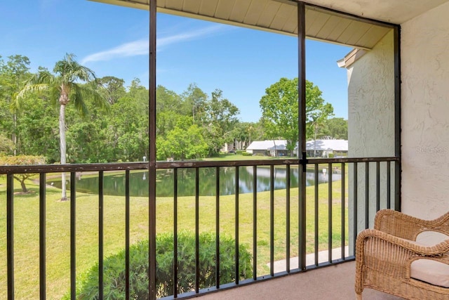 1400 Pine Glen Ln Unit B2, Tarpon Springs, FL 34688 - sunroom featuring a water view