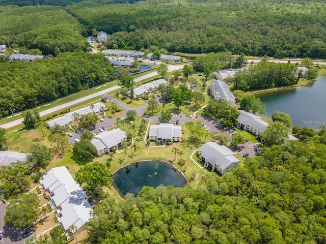 1400 Pine Glen Ln Unit B2, Tarpon Springs, FL 34688 - bird's eye view featuring a forest view and a water view