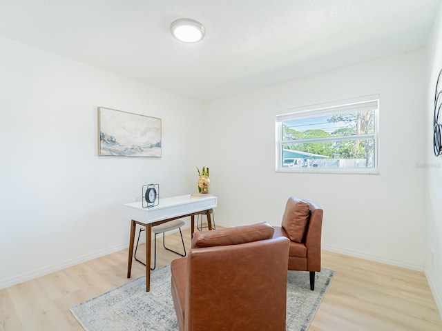 office featuring light wood finished floors and baseboards