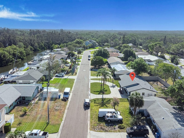 aerial view featuring a residential view and a view of trees