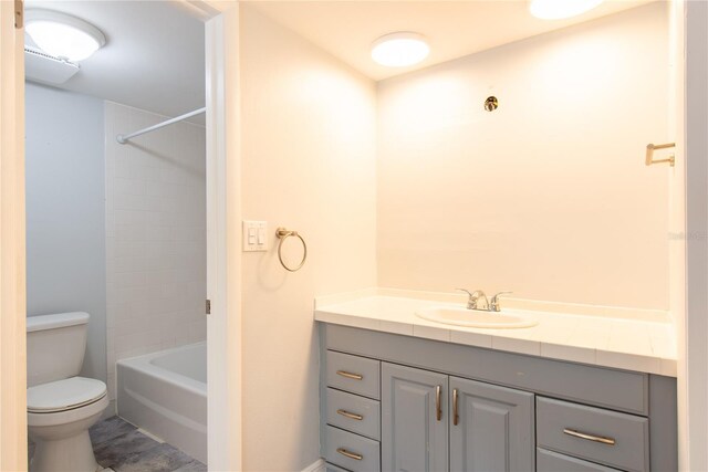 782 Village Lake Ter N Unit 102, Saint Petersburg, FL 33716 - bathroom featuring vanity, toilet, and shower / bath combination
