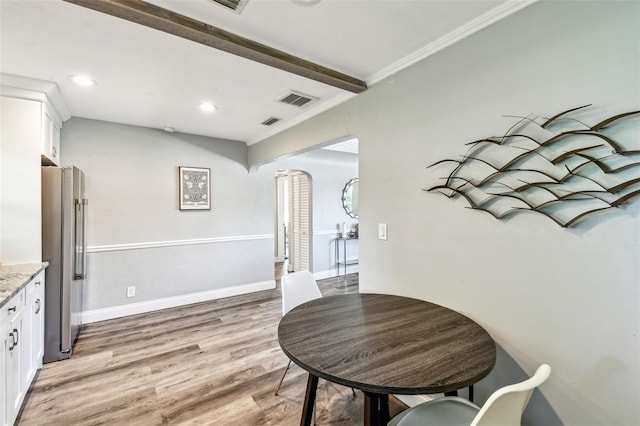 6207 Gulfport Blvd S, Gulfport, FL 33707 - dining space featuring recessed lighting, visible vents, light wood-type flooring, crown molding, and baseboards