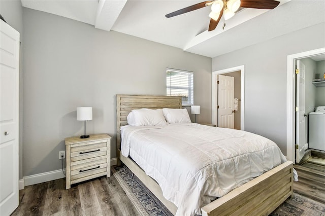 6207 Gulfport Blvd S, Gulfport, FL 33707 - bedroom featuring dark wood-type flooring, beamed ceiling, baseboards, ceiling fan, and washer / clothes dryer