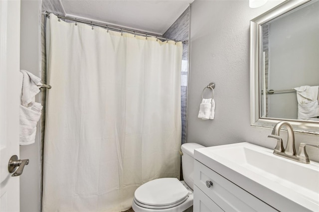 6207 Gulfport Blvd S, Gulfport, FL 33707 - bathroom with toilet, vanity, and a shower with shower curtain