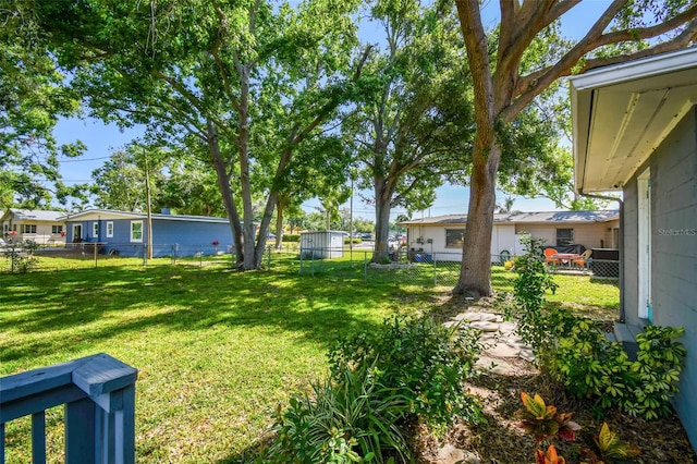 6207 Gulfport Blvd S, Gulfport, FL 33707 - view of yard featuring a fenced backyard