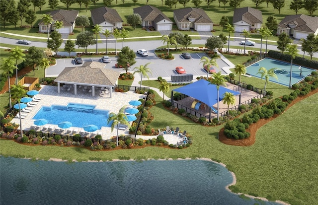 bird's eye view featuring a residential view and a water view
