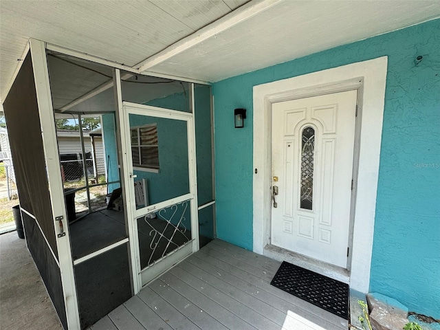 6047 67th Ave N, Pinellas Park, FL 33781 - doorway to property featuring stucco siding