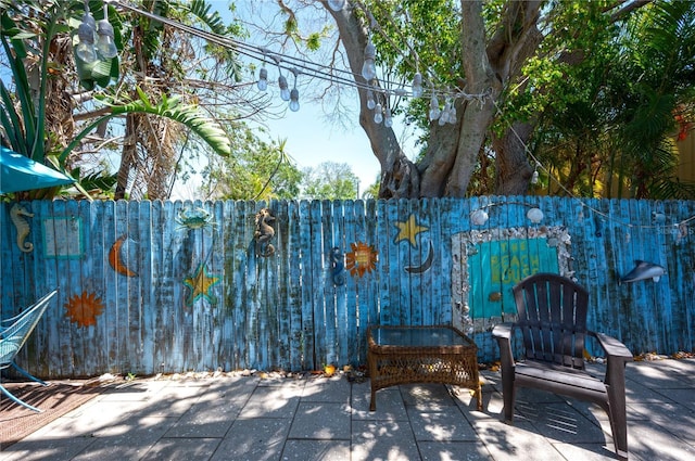 view of patio / terrace with fence