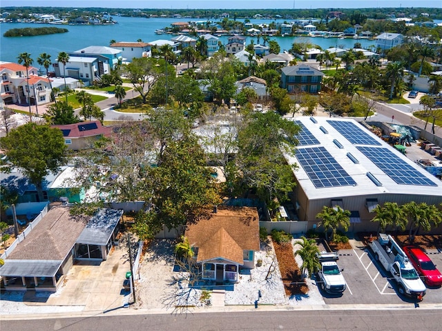 bird's eye view with a residential view and a water view