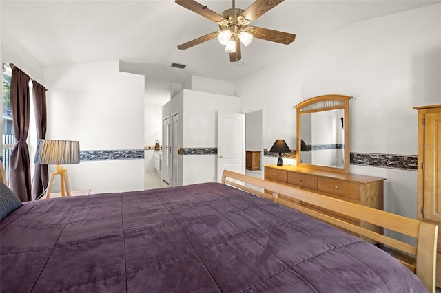 bedroom with ceiling fan, visible vents, and lofted ceiling