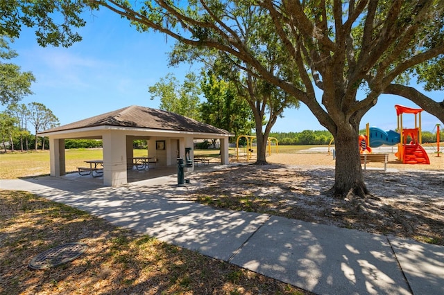 surrounding community featuring a gazebo and playground community