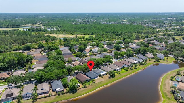 drone / aerial view featuring a water view and a residential view
