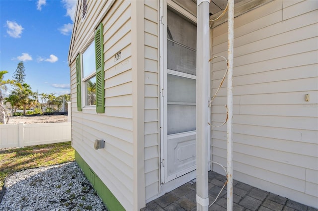 103 146th Ave E, Madeira Beach, FL 33708 - doorway to property with fence