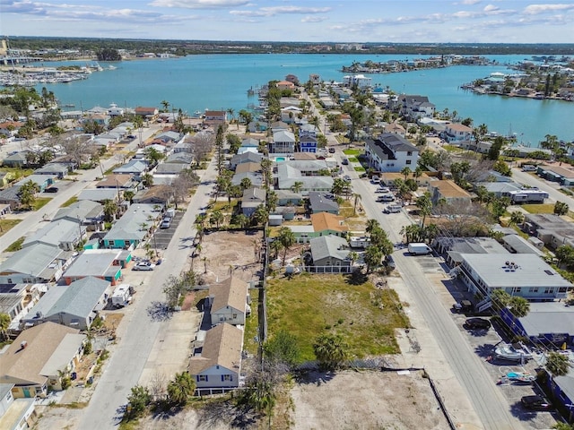 103 146th Ave E, Madeira Beach, FL 33708 - drone / aerial view featuring a water view and a residential view