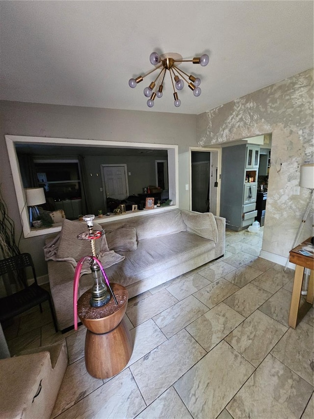 3714 E Ellicott St, Tampa, FL 33610 - living room featuring baseboards and a notable chandelier