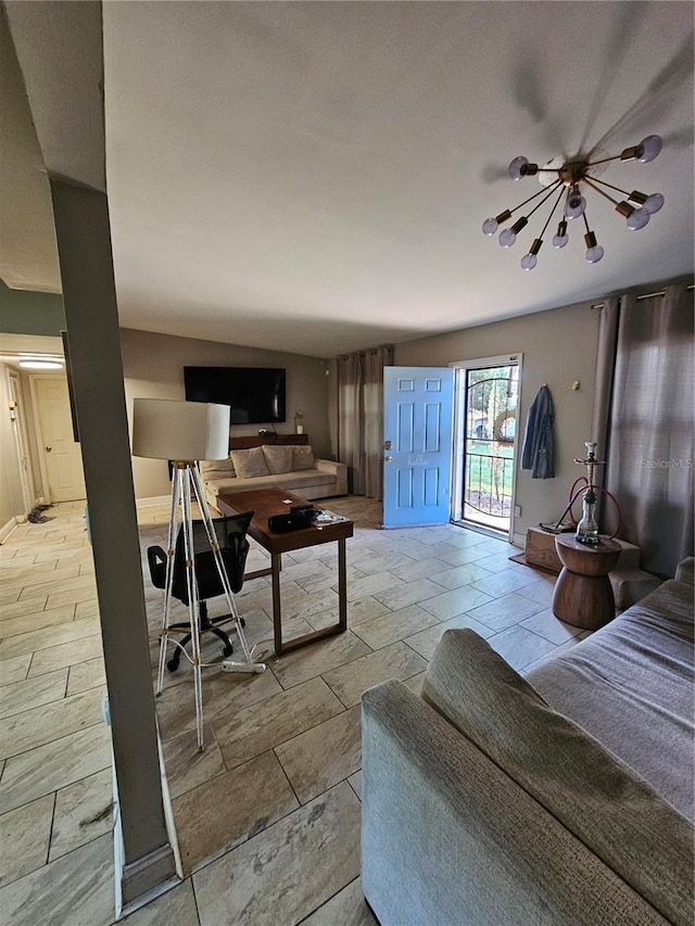 3714 E Ellicott St, Tampa, FL 33610 - living area featuring baseboards and an inviting chandelier