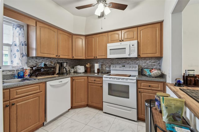 9945 47th Ave N Unit 208, Saint Petersburg, FL 33708 - kitchen with white appliances, decorative backsplash, a ceiling fan, and light marble finish flooring