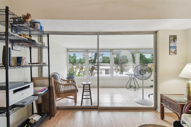 9945 47th Ave N Unit 208, Saint Petersburg, FL 33708 - sitting room featuring wood finished floors
