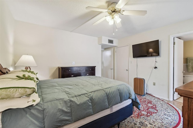 9945 47th Ave N Unit 208, Saint Petersburg, FL 33708 - bedroom featuring wood finished floors and ceiling fan