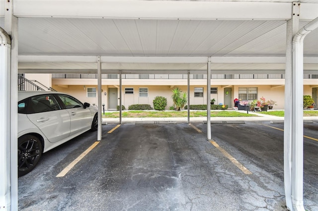 9945 47th Ave N Unit 208, Saint Petersburg, FL 33708 - garage featuring covered parking