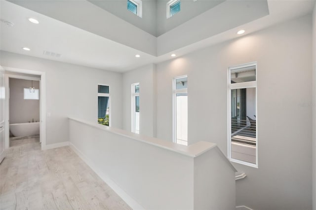 5917 Cat Claw Ln, Bradenton, FL 34210 - corridor with recessed lighting, plenty of natural light, and an upstairs landing