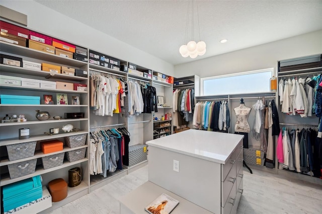 5917 Cat Claw Ln, Bradenton, FL 34210 - walk in closet featuring light wood-type flooring