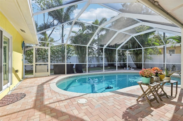 view of swimming pool with a patio, a fenced backyard, and a fenced in pool