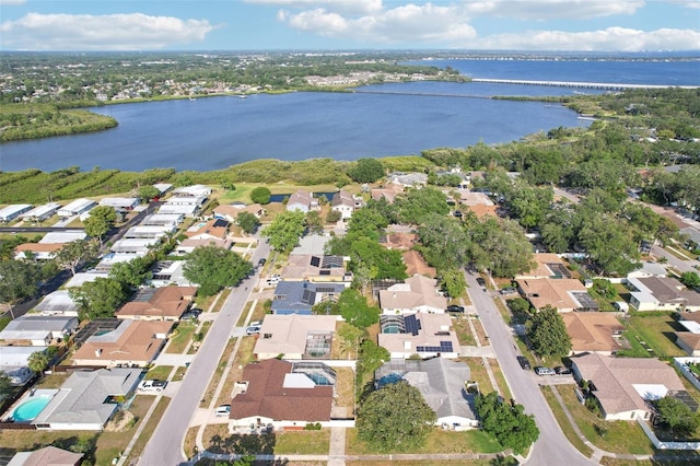 bird's eye view featuring a residential view and a water view