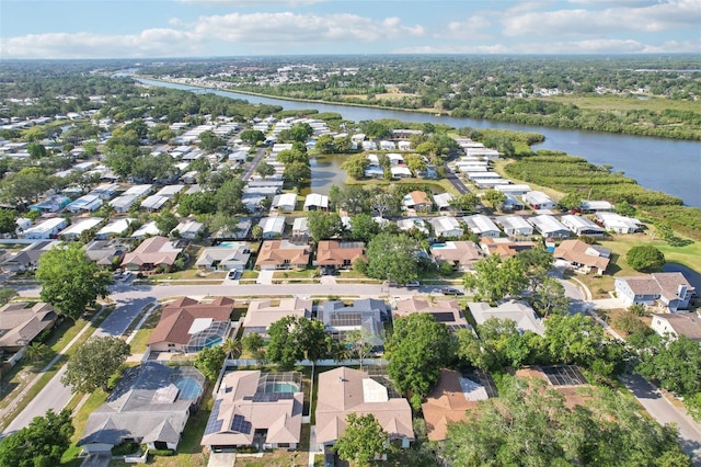 bird's eye view with a water view and a residential view