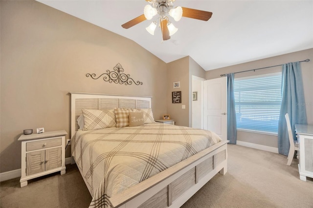 bedroom with lofted ceiling, baseboards, carpet floors, and ceiling fan
