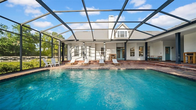 10101 Bryant Rd, Lithia, FL 33547 - swimming pool with a patio, a lanai, and french doors