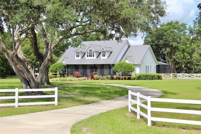 10101 Bryant Rd, Lithia, FL 33547 - cape cod house with a metal roof