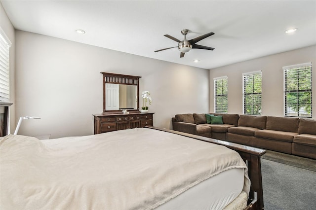 bedroom featuring recessed lighting, a ceiling fan, and multiple windows
