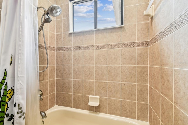 full bath with shower / bath combination with curtain