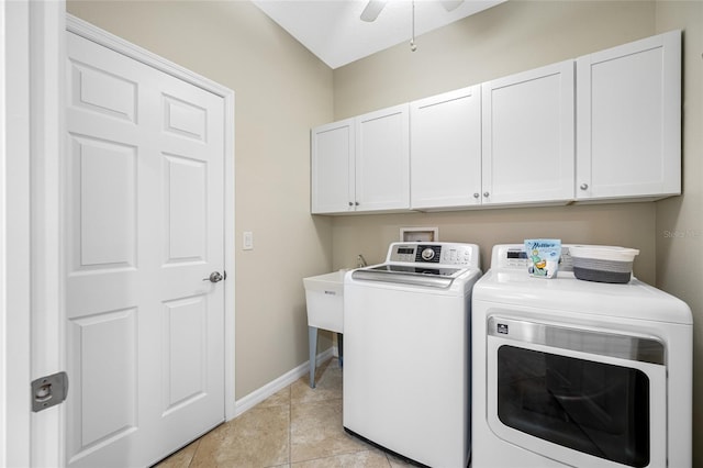 2527 Silverback Ct, Palm Harbor, FL 34684 - washroom featuring light tile patterned floors, ceiling fan, cabinet space, washing machine and dryer, and baseboards