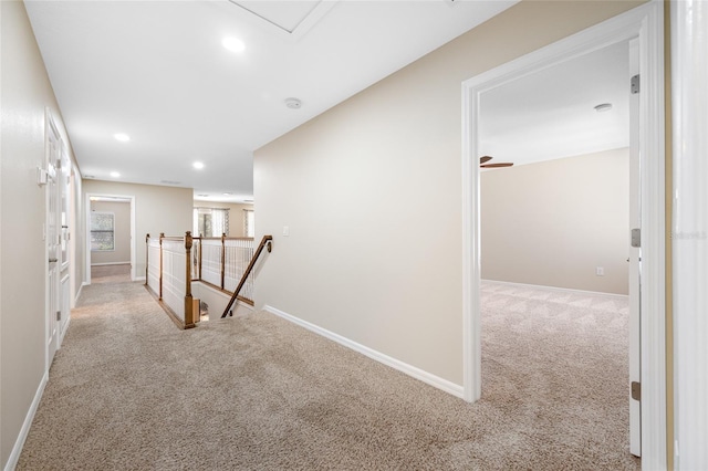 2527 Silverback Ct, Palm Harbor, FL 34684 - corridor with recessed lighting, an upstairs landing, and light colored carpet