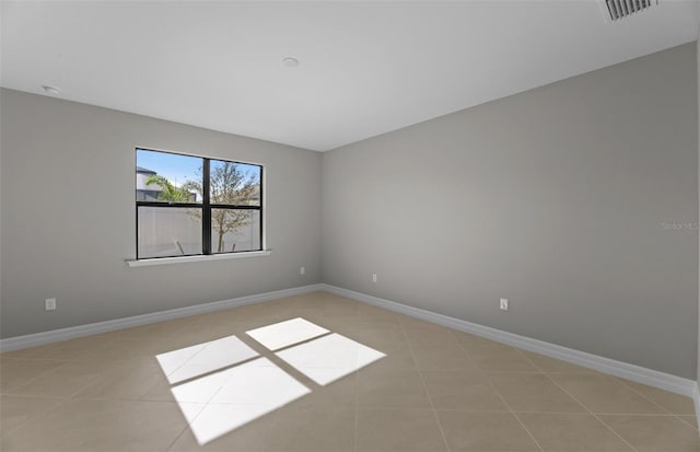2528 Charter Oak Dr, North Port, FL 34289 - spare room featuring visible vents, baseboards, and light tile patterned floors